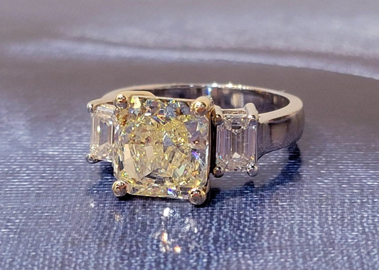 14K W/Y Trinity Ring with Fancy Light Yellow Diamond Centre