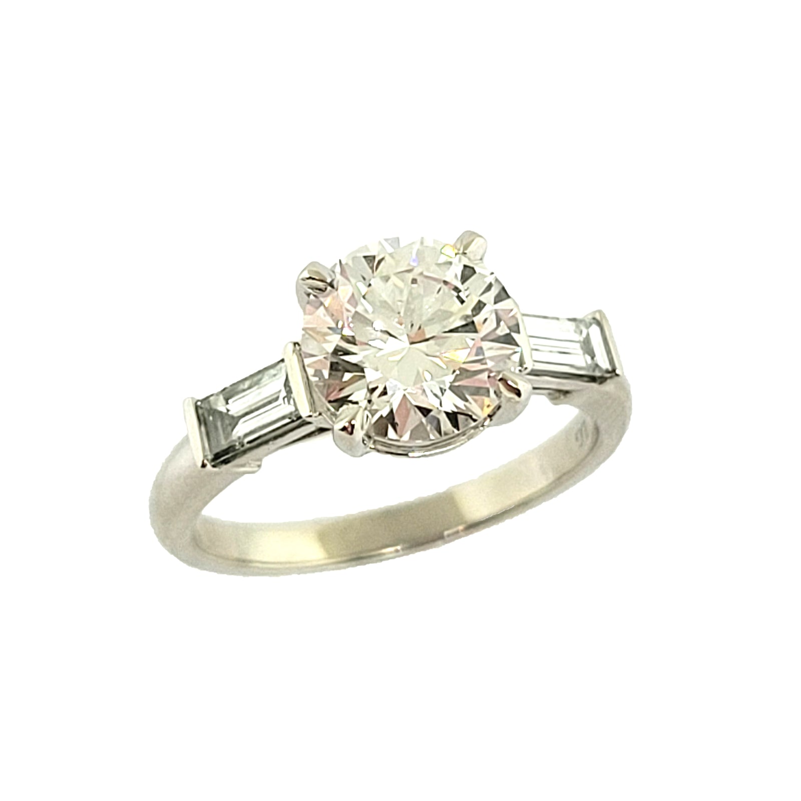 Platinum 3-Stone Lab Grown Diamond Ring with Round and Baguette Cuts