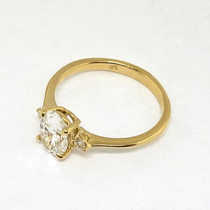 14K Y/G 3- Stone Lab Grown Diamond Ring with Oval Centre and Round Accents