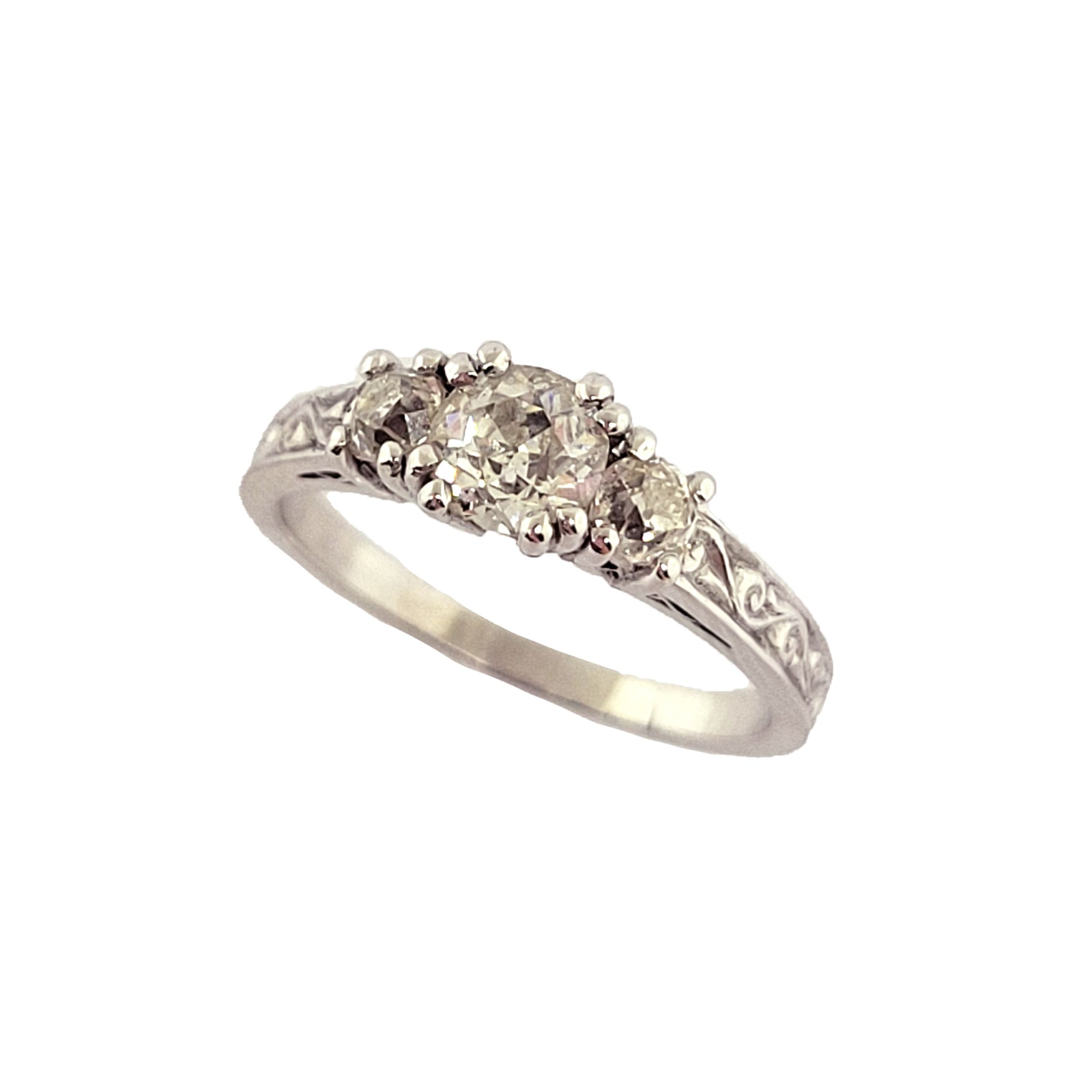 Vintage Old Mine Cut Platinum 3-Stone Diamond Ring with Scroll Details