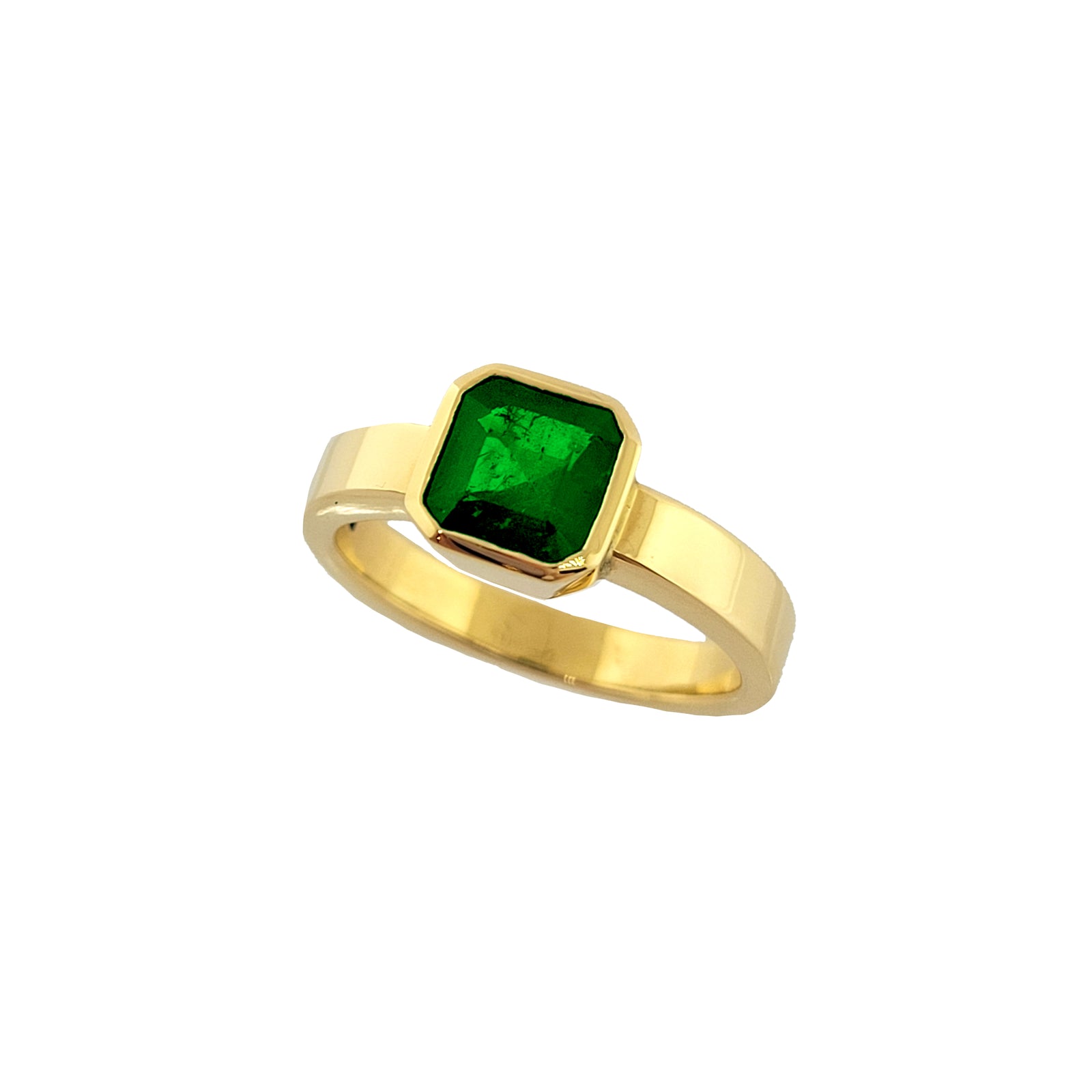 18K Y/G Bezel Set Emerald Ring with a Stirrup Shaped Shank